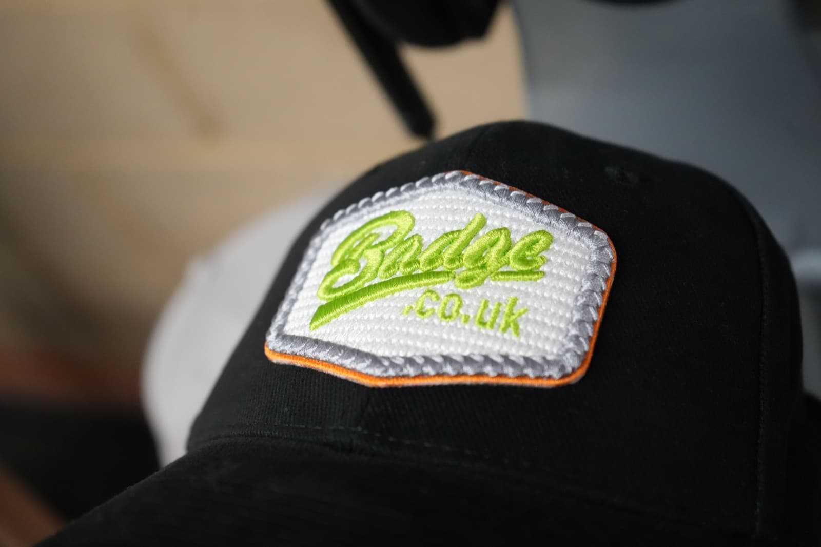 Gallery sample of 3D puff cap embroidery showing raised stitch detail