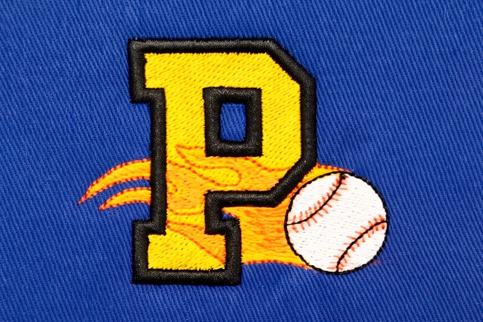 Multi-color embroidered sports crest on a team jersey