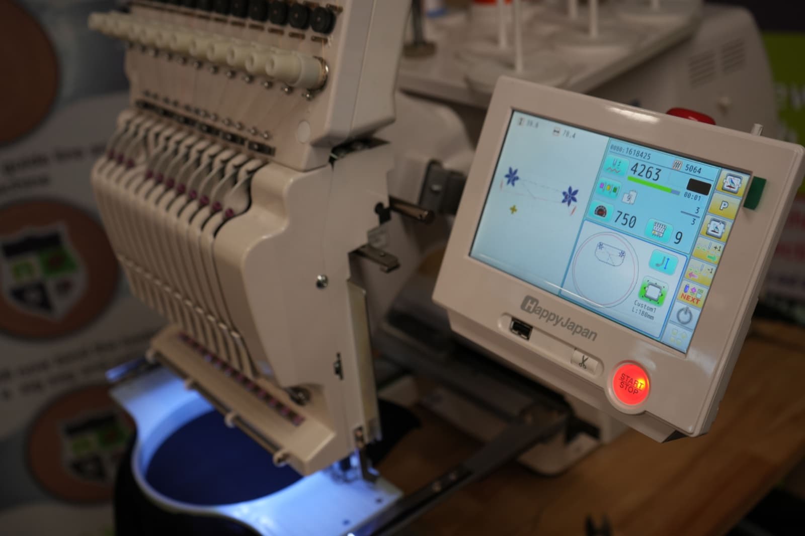Commercial embroidery machine control screen showing digitized design loaded